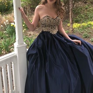 Betsy and Adam satin ball gown. (David’s Bridal)